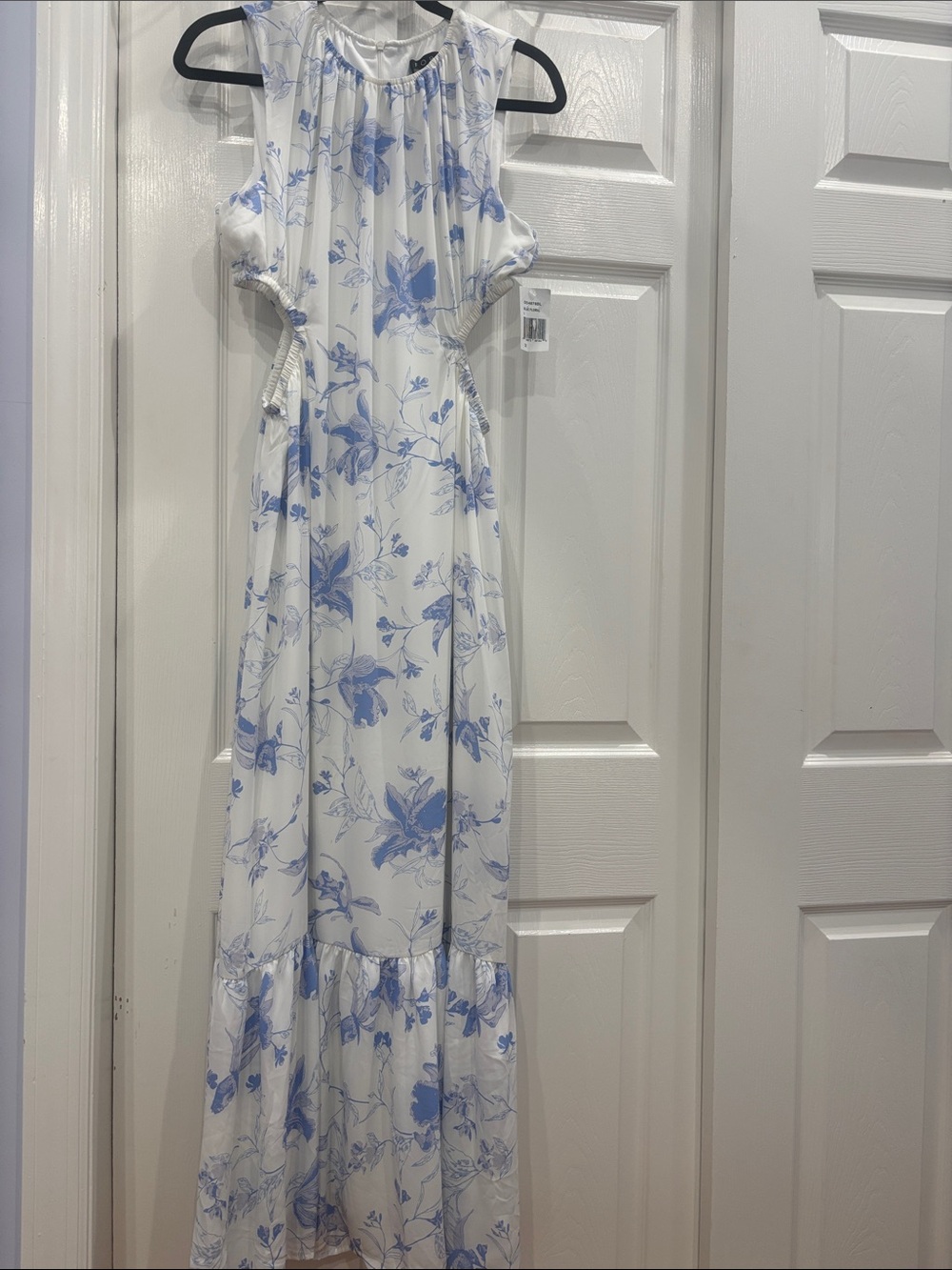 Sleeveless White Maxi Dress with Light Blue Floral Print
